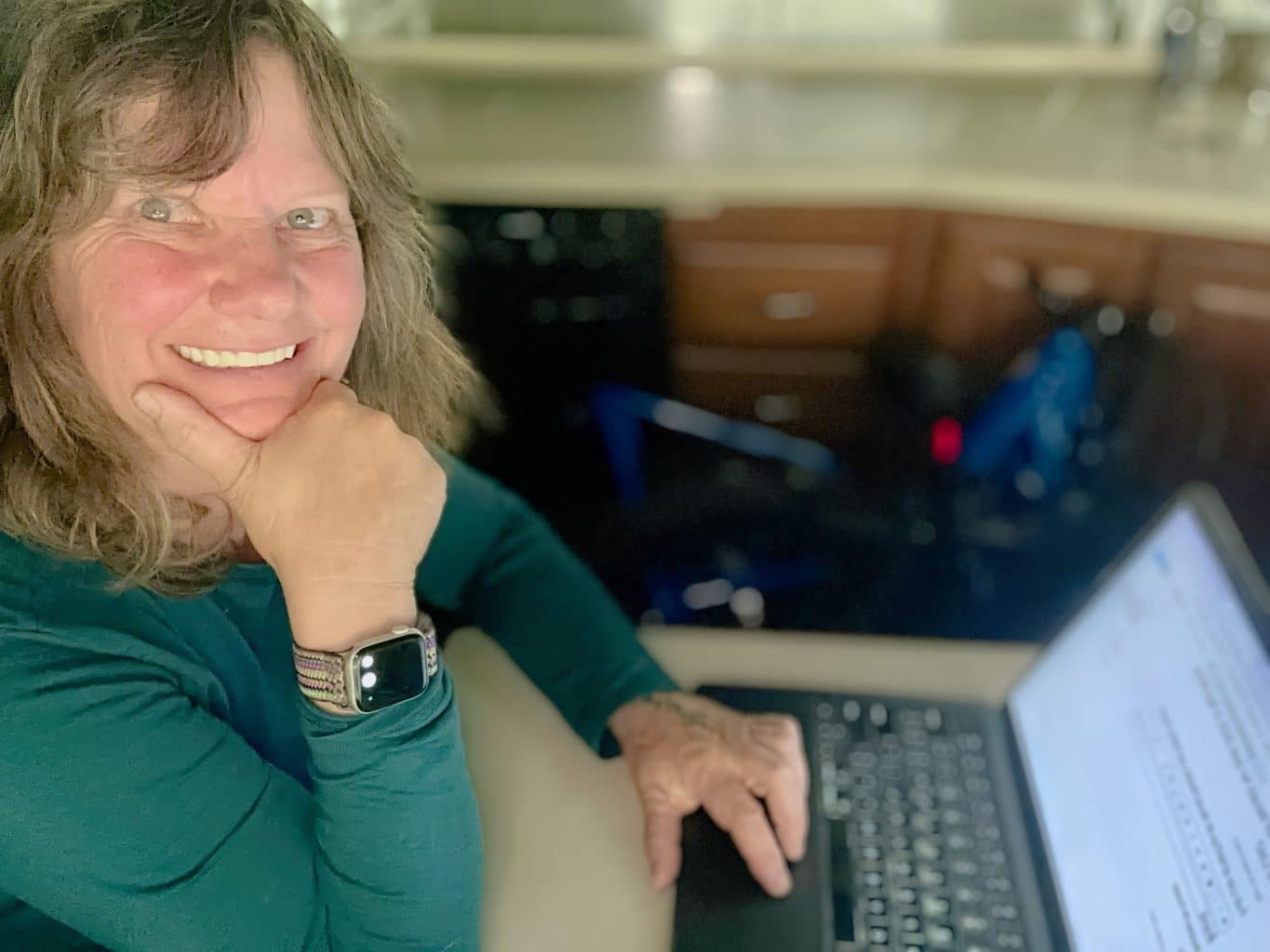 Lynne Fedorick RV Writer at her computer